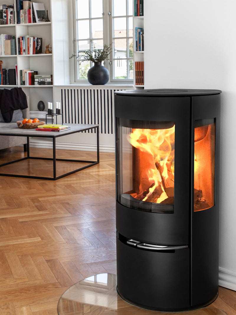 Aduro 17 wood burning stove with sleek black finish and large glass panels showcasing a 180-degree flame view.