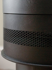 Side view of the British Fires Ashurst Electric Stove, showcasing its cylindrical steel body and textured paint finish.