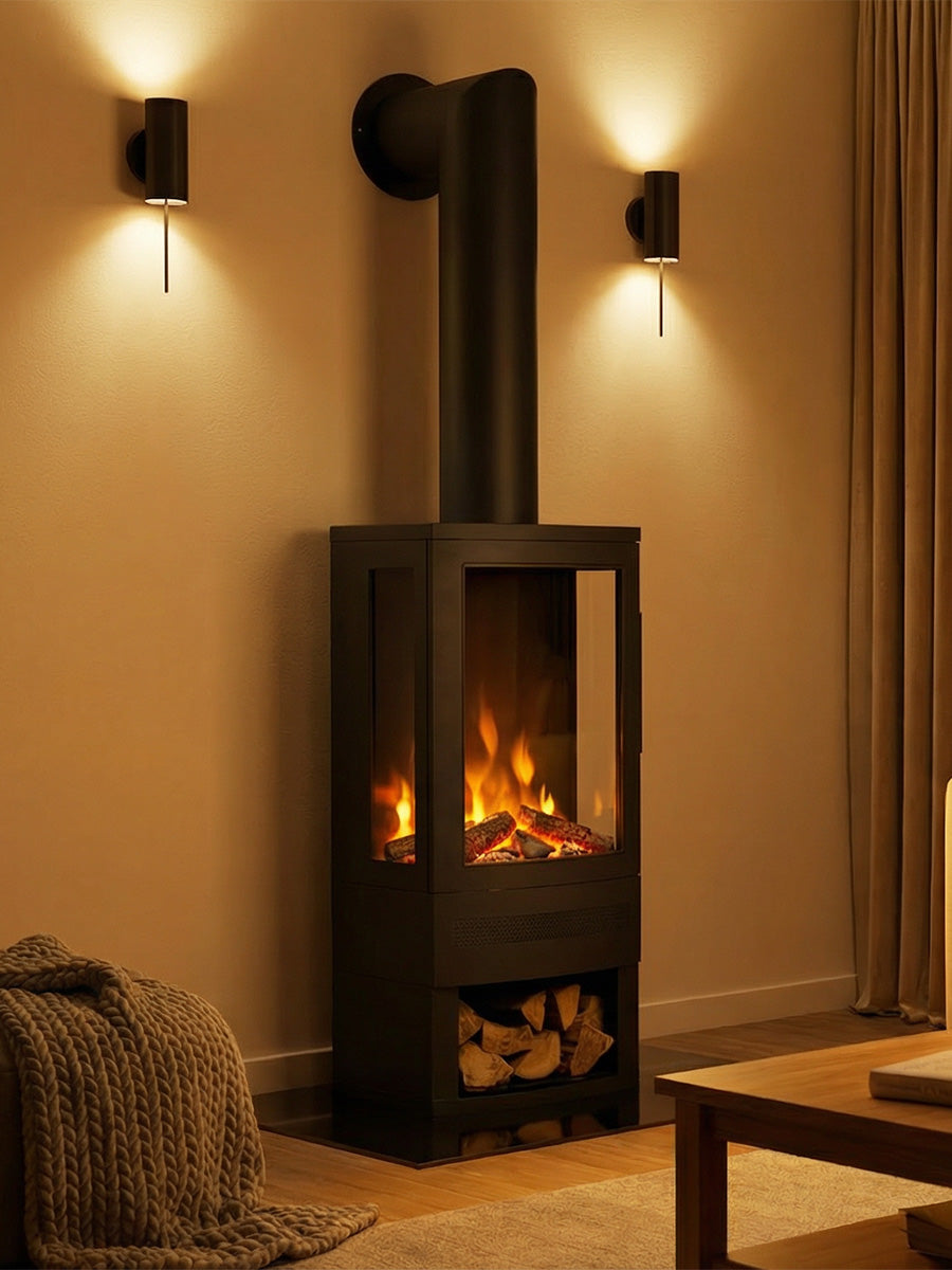 Contemporary British Fires Bramshaw electric stove in textured steel, showcasing a square design with panoramic side-view ports.