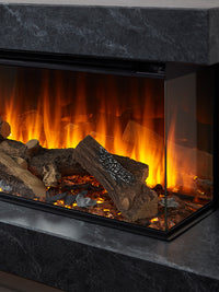 Side view of the British Fires Brockenhurst electric fire suite, showcasing its sleek design and three-sided glass flames.