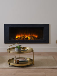 Side view of the British Fires Holbury electric fire suite, showcasing its sleek, inset design and realistic flame display.