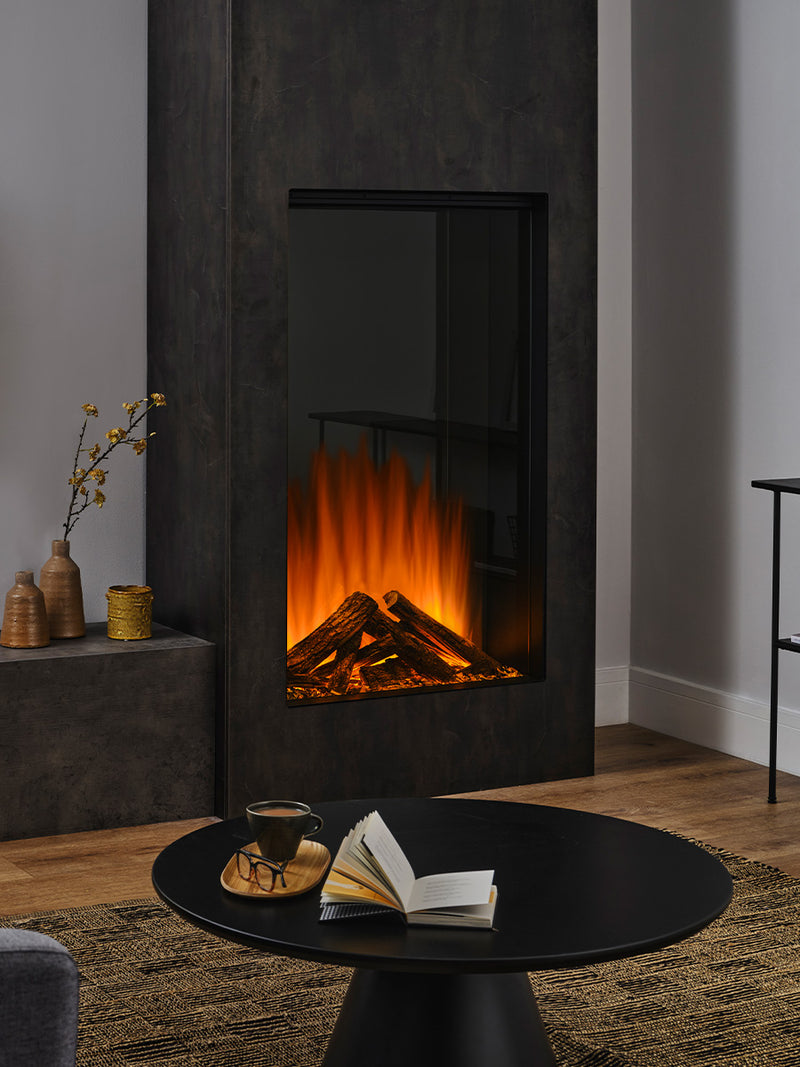 Side view of the British Fires Knightwood Electric Fire with hand-scorched oak logs and mirrored glass for depth.
