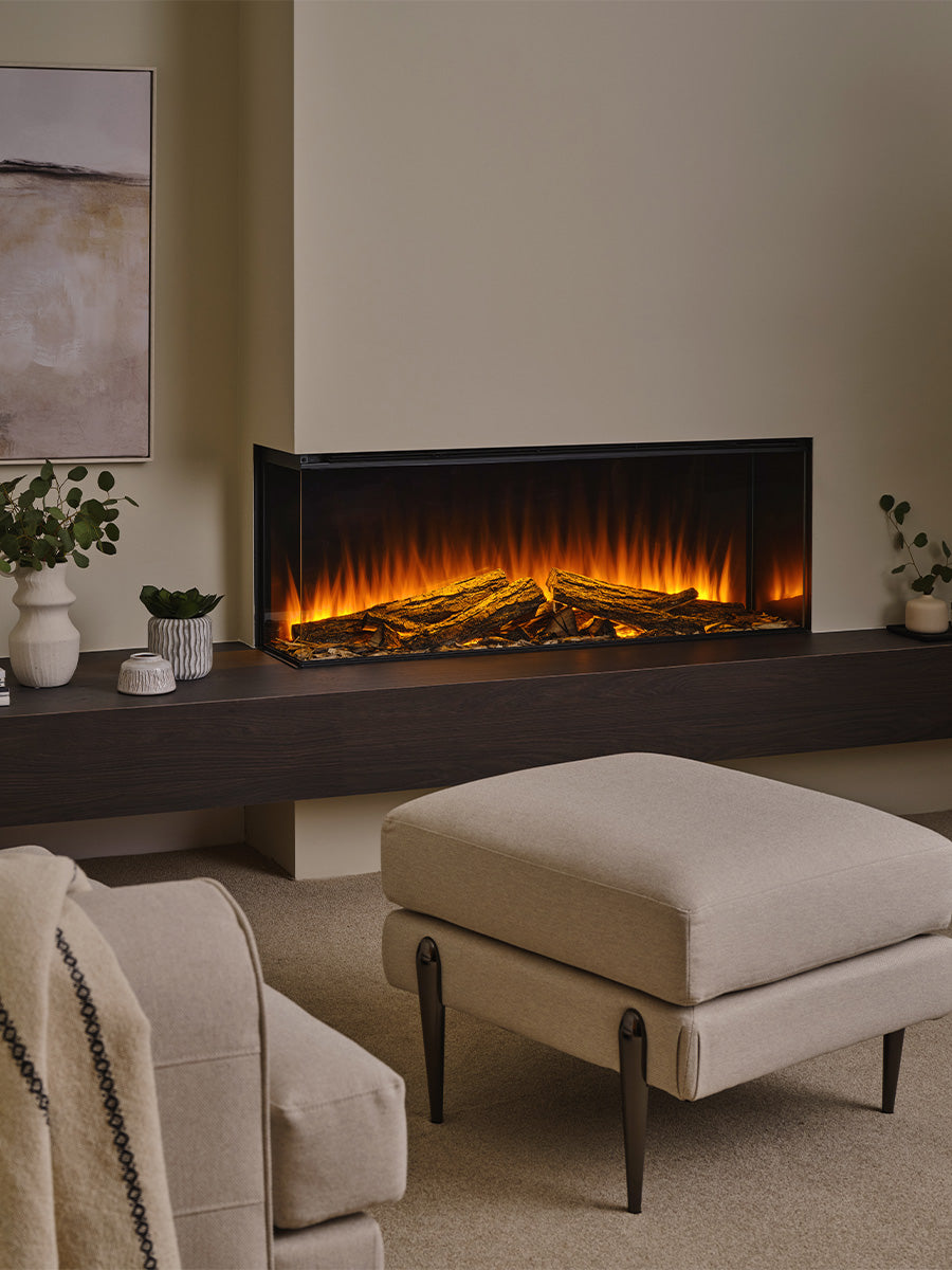 Side view of the British Fires New Forest 1200 electric fire, showcasing its sleek glass front and modern design.