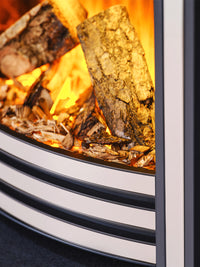 Side view of British Fires Sway 16" electric fire in Black Chrome frame, showcasing its classic curved fret design.
