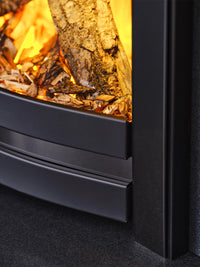 Side view of the British Fires Sway 16" electric fire in a sleek black frame, showcasing its modern design and flames.