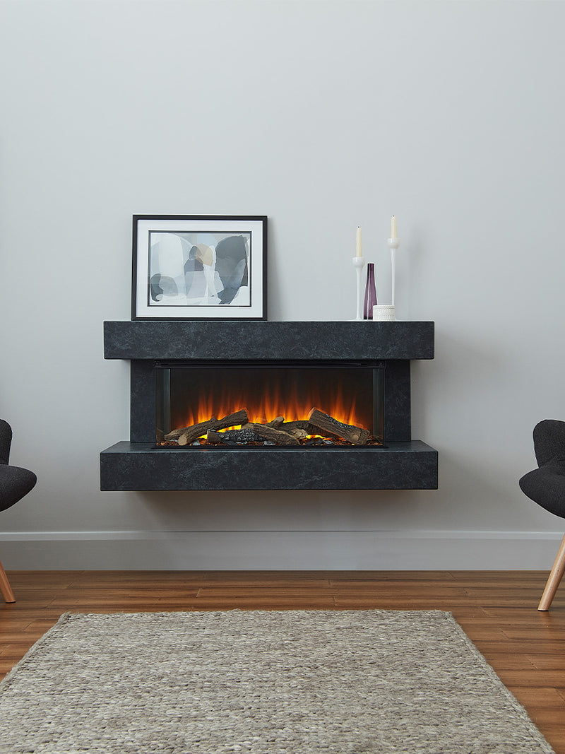 British Fires Winchester Electric Fire Suite in white with three-sided glass, showcasing flames and mirrored rear glass.