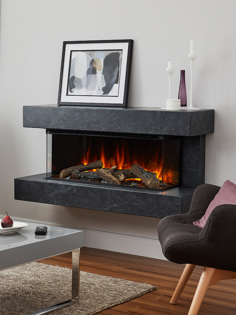 Side view of the British Fires Winchester Electric Fire Suite showcasing its three-sided glass and mirrored rear.