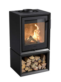 Side view of the Contura 130 wood burning stove in black cast iron, showcasing its compact design and log compartment.