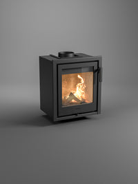 Side view of Contura i1 wood burning fireplace insert with cast iron door and sleek design, showcasing three-sided frame option.