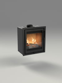 Side view of the Contura i2 wood burning fireplace insert with a sleek cast iron door and glass front.
