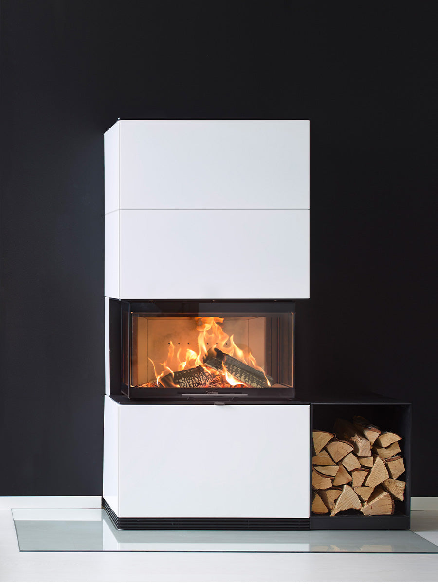 Contura i51 wood burning fireplace with three-sided glass, modern design, and spacious firebox in a stylish living room setting.