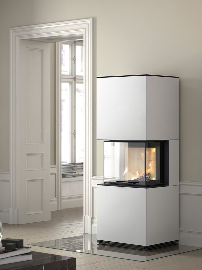 Tall Contura i61 wood burning fireplace with black metal finish and cast iron door, showcasing side glass panels.