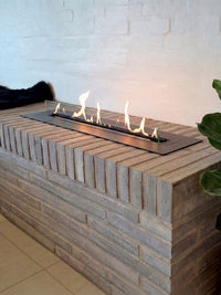 Side view of the Decoflame Denver F6 2520 Bioethanol Burner showcasing its sleek design and vibrant flames.
