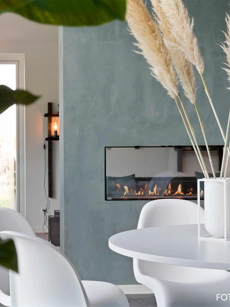 Side view of Decoflame Montreal 1200mm tunnel bioethanol fireplace with sleek glass panels and modern design.