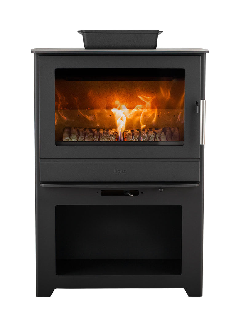 Side view of the Heta Inspire 55 wood burning stove showcasing its steel body and panoramic flame view.