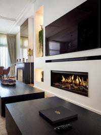 Front view of Kalfire E-One 100F electric fire showcasing holographic flames and ceramic logs in a sleek black frame.