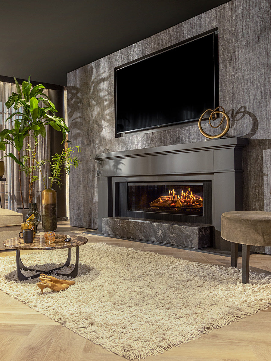 Front view of Kalfire E-One 130F electric fire with realistic 3D flames and ceramic logs in a sleek black frame.