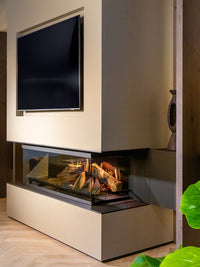 Side view of Kalfire E-One 130S electric fire showcasing three-sided glass and holographic flames in a modern setting.