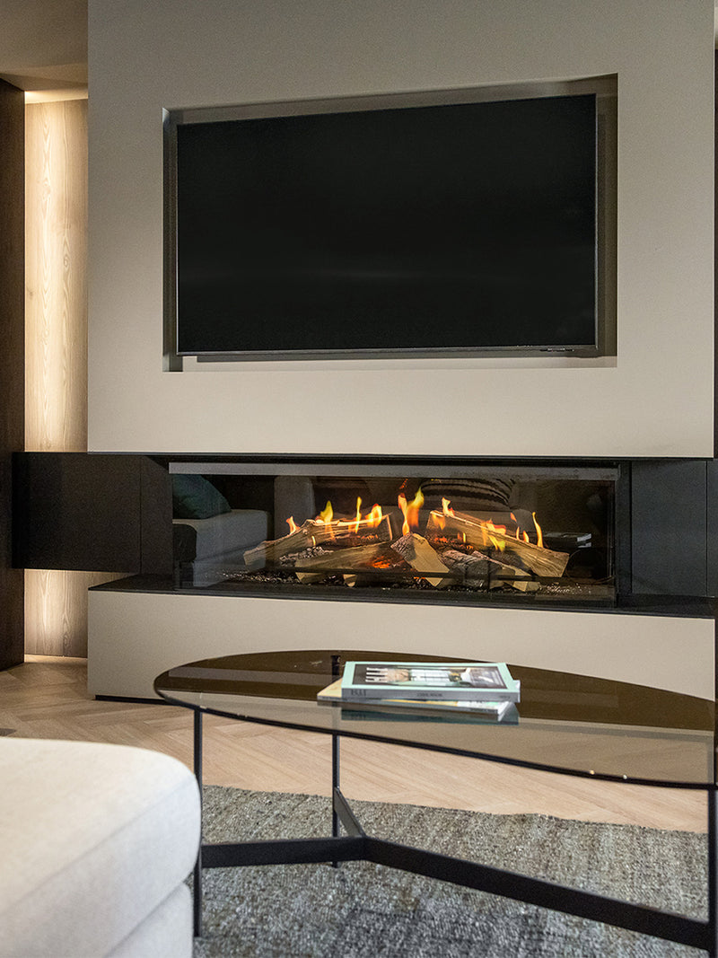 Three-sided Kalfire E-One 130S electric fireplace with holographic flames, glass panels, and sleek modern design.