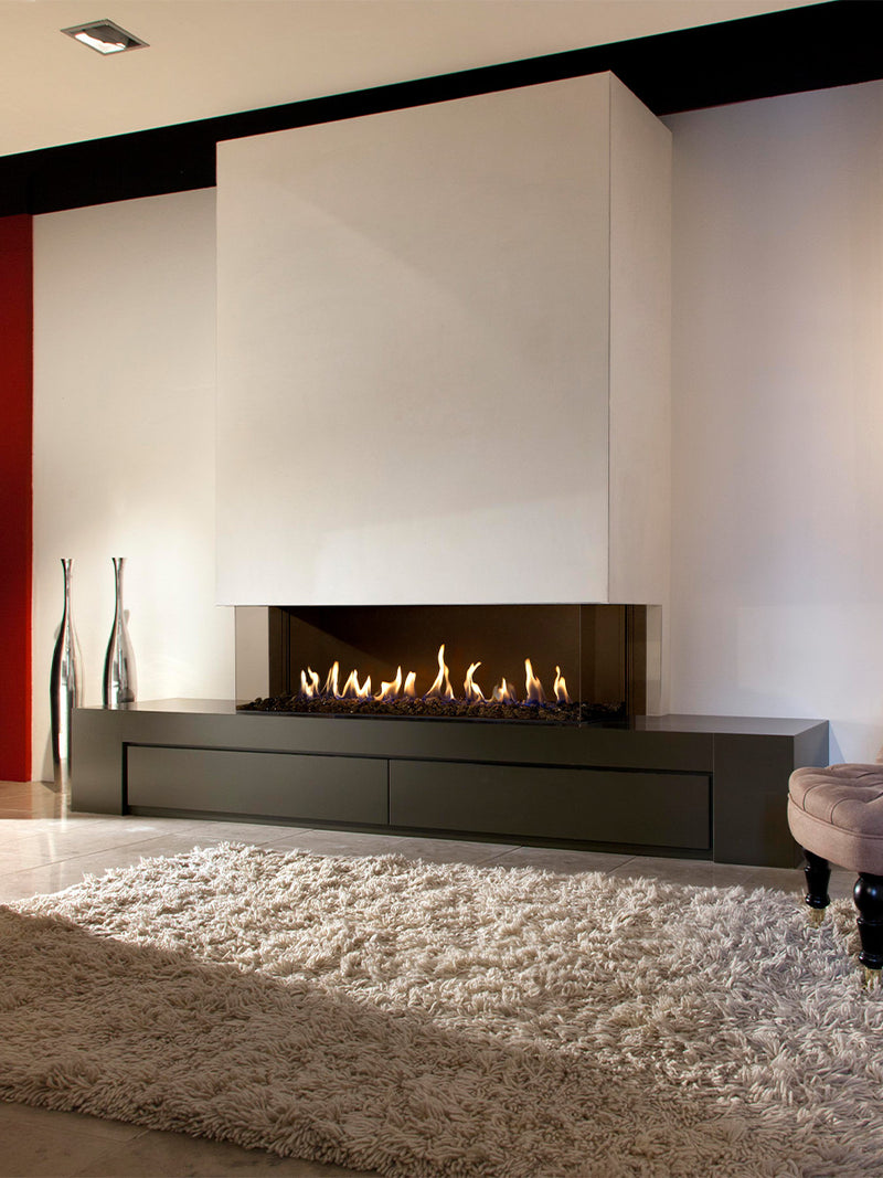 Three-sided Kalfire G130/37S gas fire with panoramic glass, showcasing flames and sleek design in a modern setting.