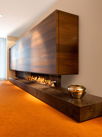 Side view of Kalfire G170/37S three-sided gas fire showcasing flames through expansive glass panels.