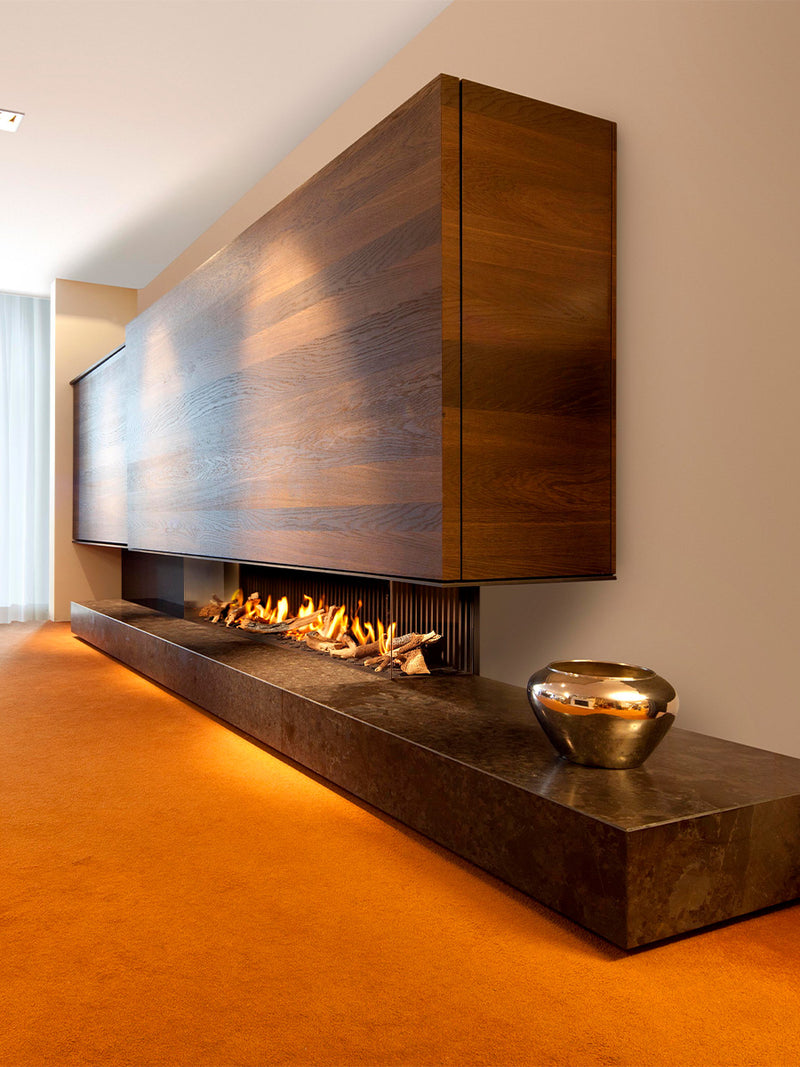 Side view of Kalfire G170/37S three-sided gas fire showcasing flames through expansive glass panels.