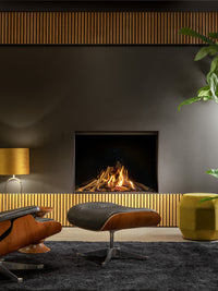 Front view of Kalfire Gi105/79F gas fireplace with glass window showcasing dynamic flames and sleek black finish.