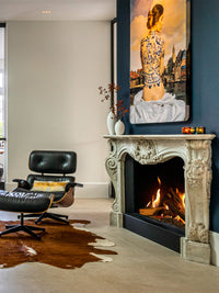Side view of Kalfire GP105/59F gas fire with sleek black frame and large glass window showcasing vibrant flames.
