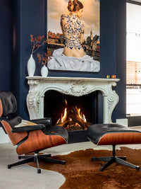 Front view of Kalfire GP105/59F gas fire with a wide glass window and sleek black frame, showcasing its flame presence.