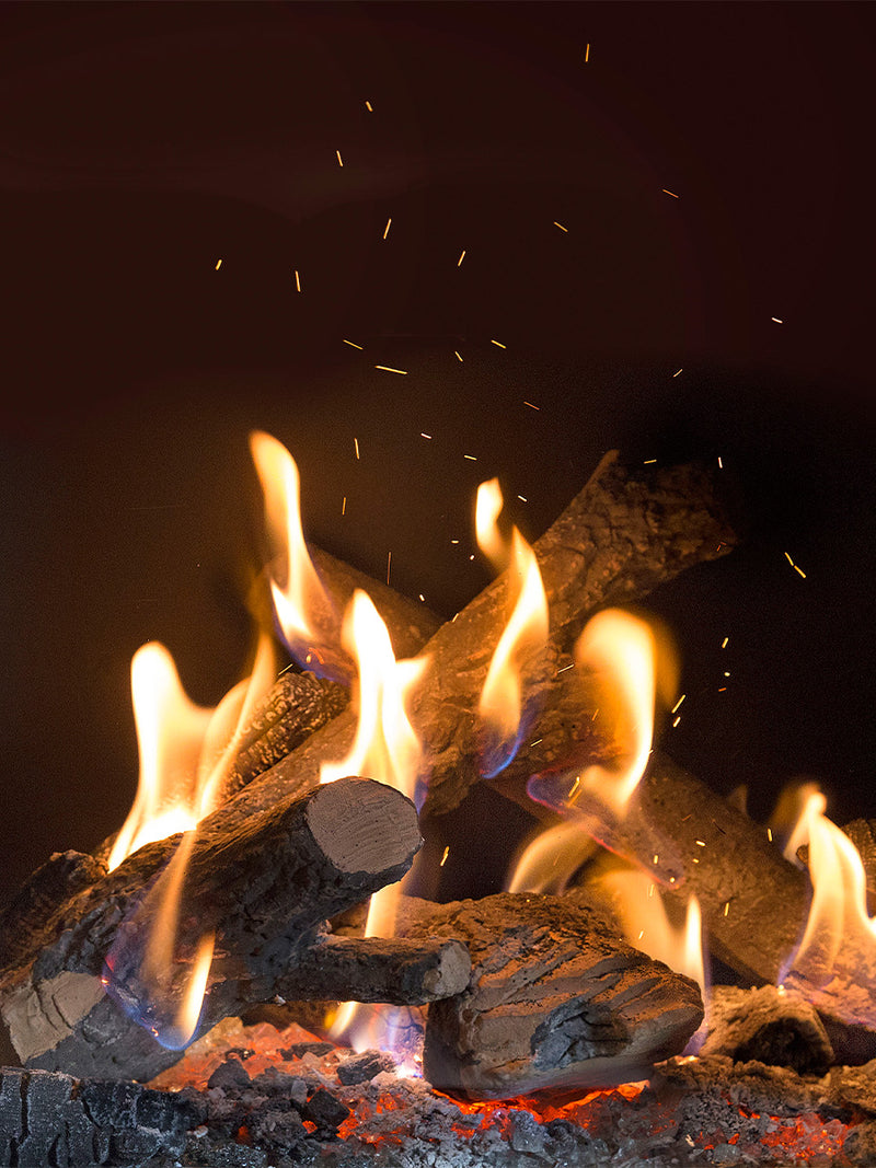 Side view of Kalfire GP60/59F gas fire with sleek black finish and large glass window showcasing realistic flames.