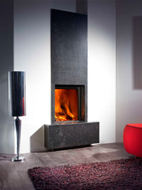 Front view of Kalfire W45/48F log burner fireplace with frameless curved glass and sleek design in a modern setting.