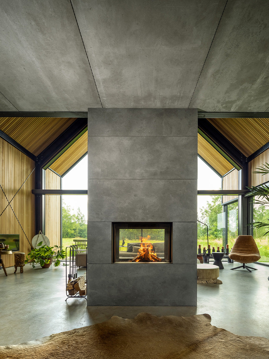 Kalfire W80/52T tunnel wood burner fireplace with frameless glass, showcasing a modern design and dual viewing sides.
