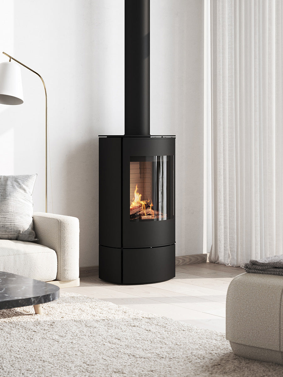 Side view of the RAIS Caro 90 Gas Fire showcasing the glass door and panoramic side panels. Elegant design in black finish.