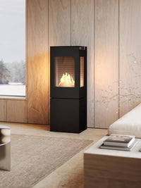Side view of the RAIS Nexo 120 bioethanol fireplace with a sleek glass door and modern cubic design.