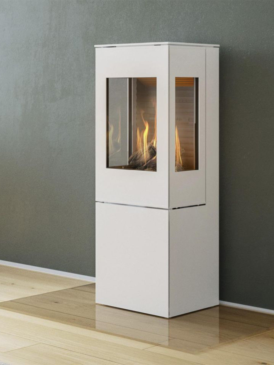 Elegant RAIS Nexo 140 gas fireplace with glass door, showcasing clean lines and large glass panes in a modern setting.