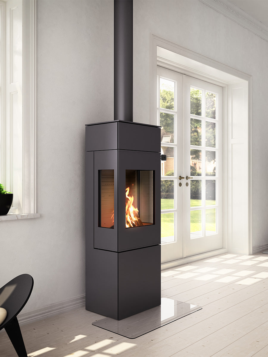 Elegant RAIS Nexo 140 wood burning stove with glass door, showcasing smooth surfaces and geometric design, side view.