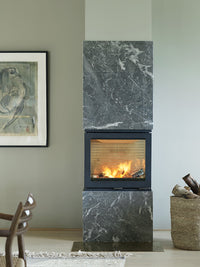 Side view of the Rais 600 3 Inset Wood Burning Stove showcasing three glass panes and sleek cube-shaped design.