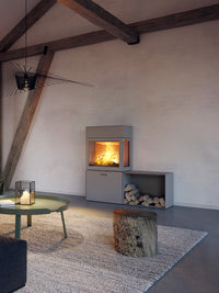 RAIS 600 Max wood burning stove in black with a glass door, showcasing a sleek design and modern aesthetic.