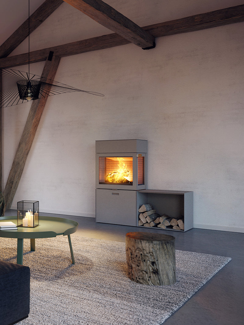 RAIS 600 Max wood burning stove in black with a glass door, showcasing a sleek design and modern aesthetic.